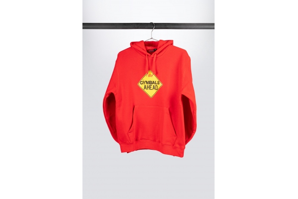 red hooded sweatshirt with Cymbals Ahead logo on chest